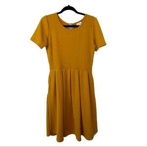LuLaRoe Dress, Woman’s size Medium. Yellow/Gold.